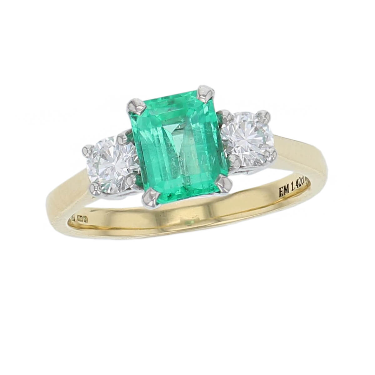emerald cut diamond trilogy ring